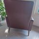 a pair of comfortable vintage armchairs with splayed legs