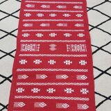 Handmade red and white carpet