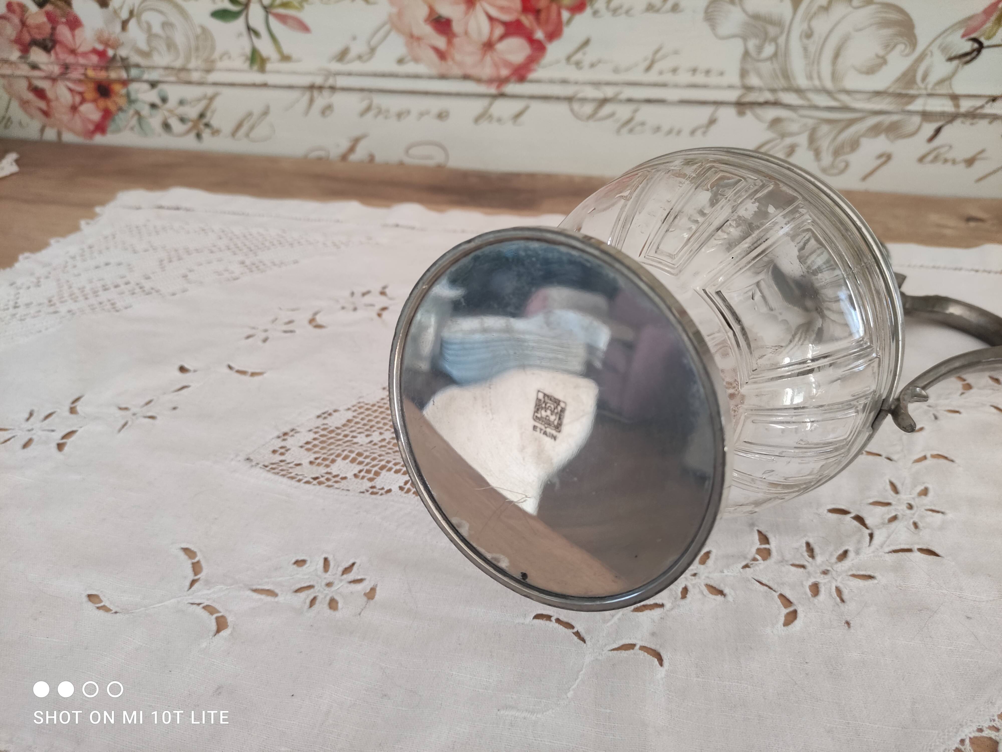 Old water decanter in curved glass and tin Art Nouveau style