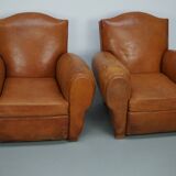 Pair of French club chairs with moustache back in cognac leather, 1950s