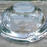 Solid half-sphere ashtray in transparent glass