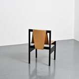 Set of black lacquered wooden chairs with leather, Swiss architect's work, 1980s.