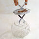 Sugar bowl with integrated clamp