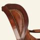 Rocking chair with footrest, wood and tufted leather
