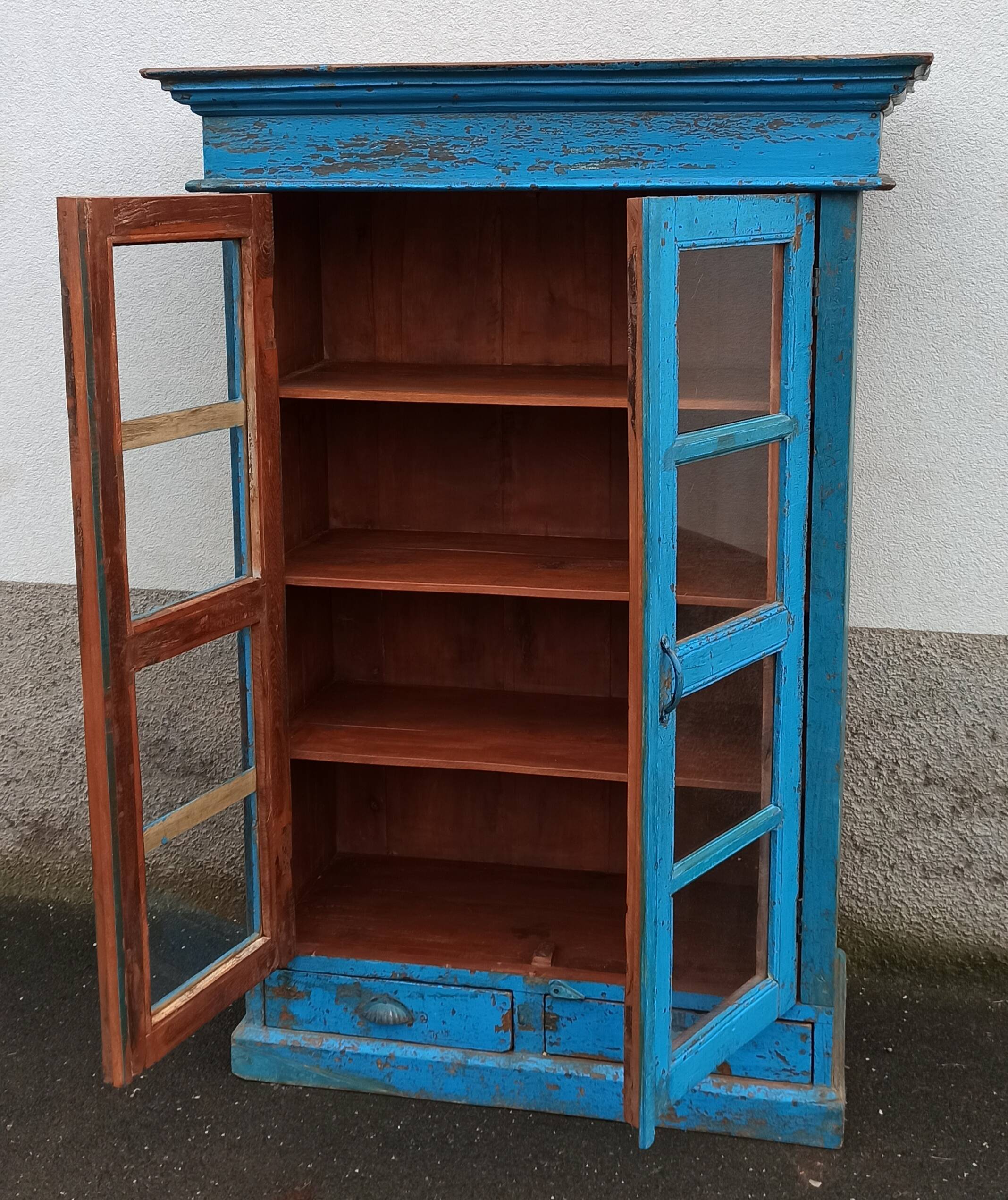 Old wooden glazed cabinet with two doors and two drawers