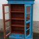 Old wooden glazed cabinet with two doors and two drawers