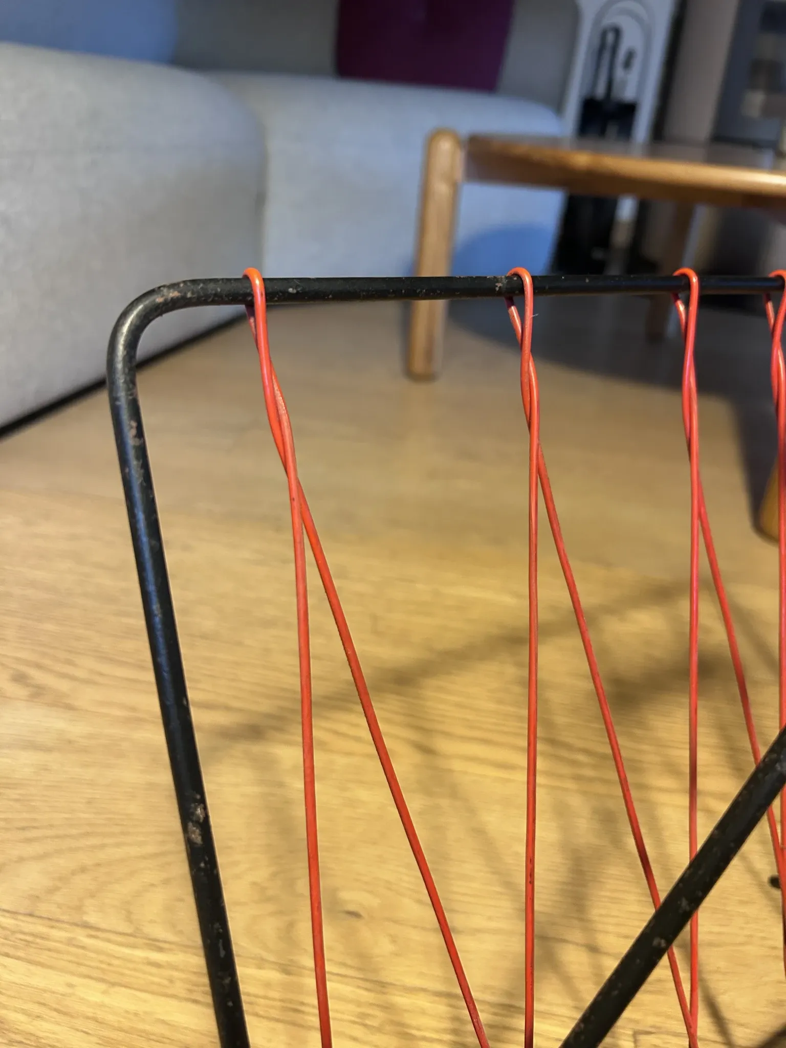 Vintage red and black scoubidou magazine rack, 1950s/60s