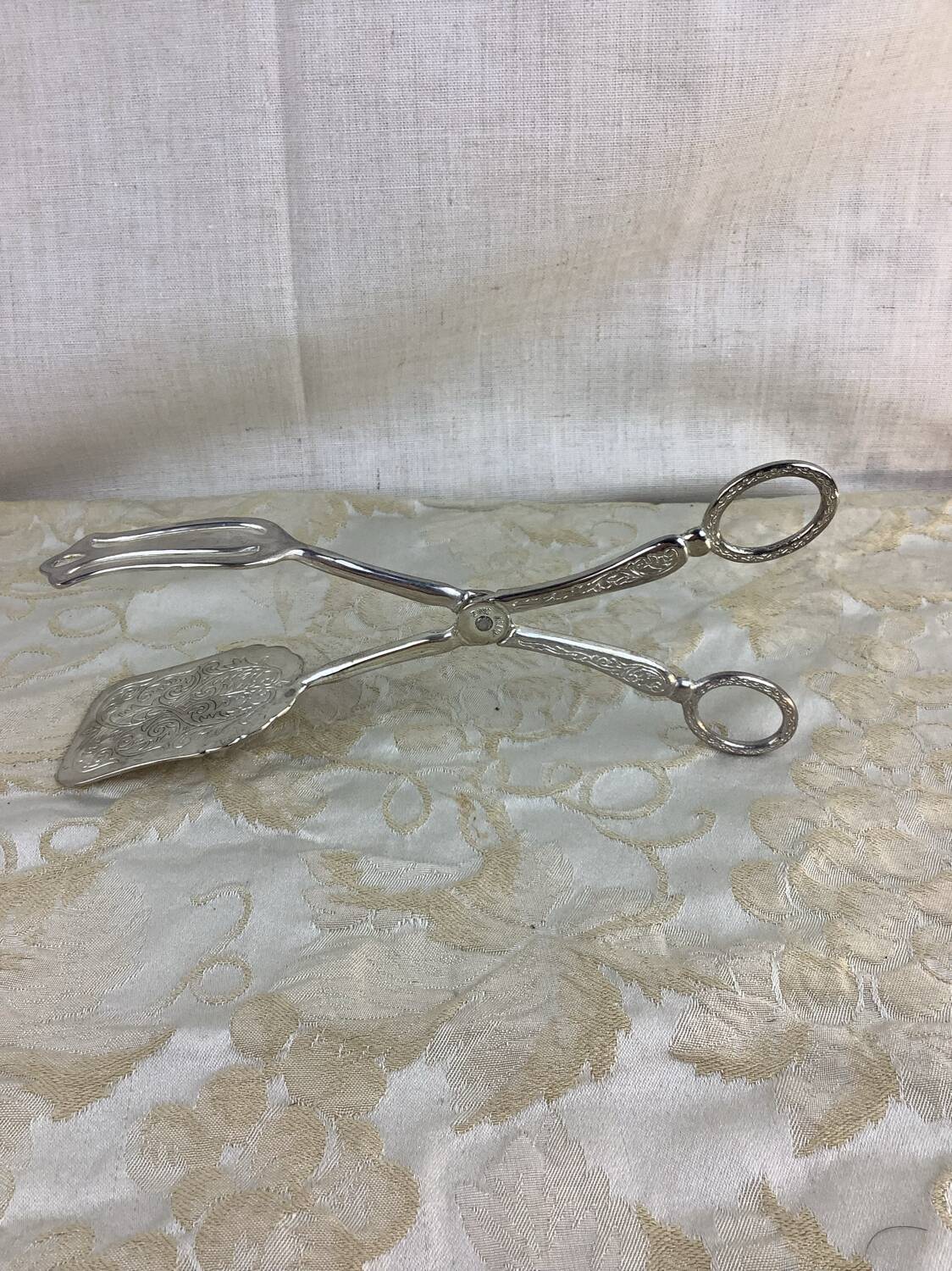 Old cutlery tongs