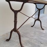Restaurant bistro table in oval marble and decorated cast iron bases -1m51