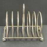 Toast holder in silver metal