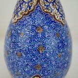 Piriform vase with a flared metal collar enamelled with a polychrome decoration, marked "Amini Iran" on the reverse.