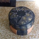 2 leather poufs