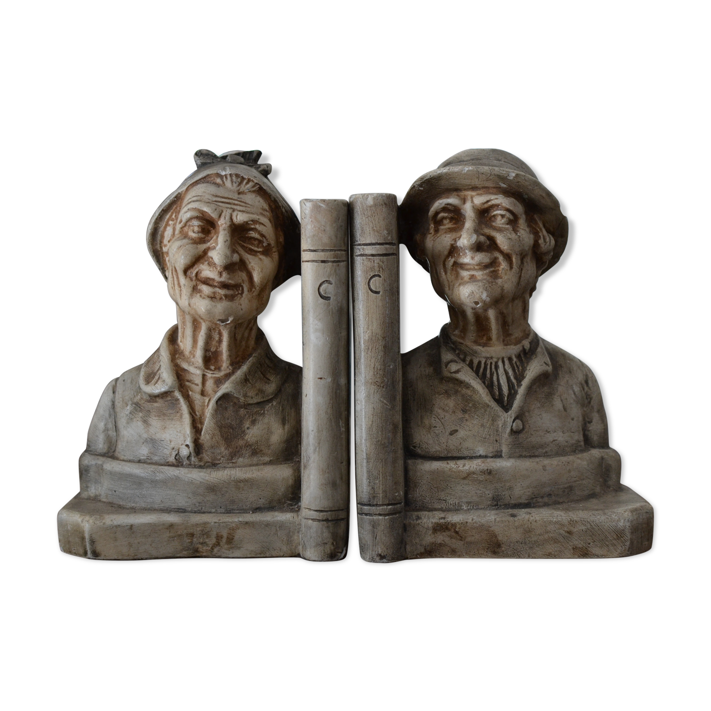 Book-clamps couple of realistic old men in plaster