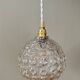 Suspension globe vintage en verre moulé