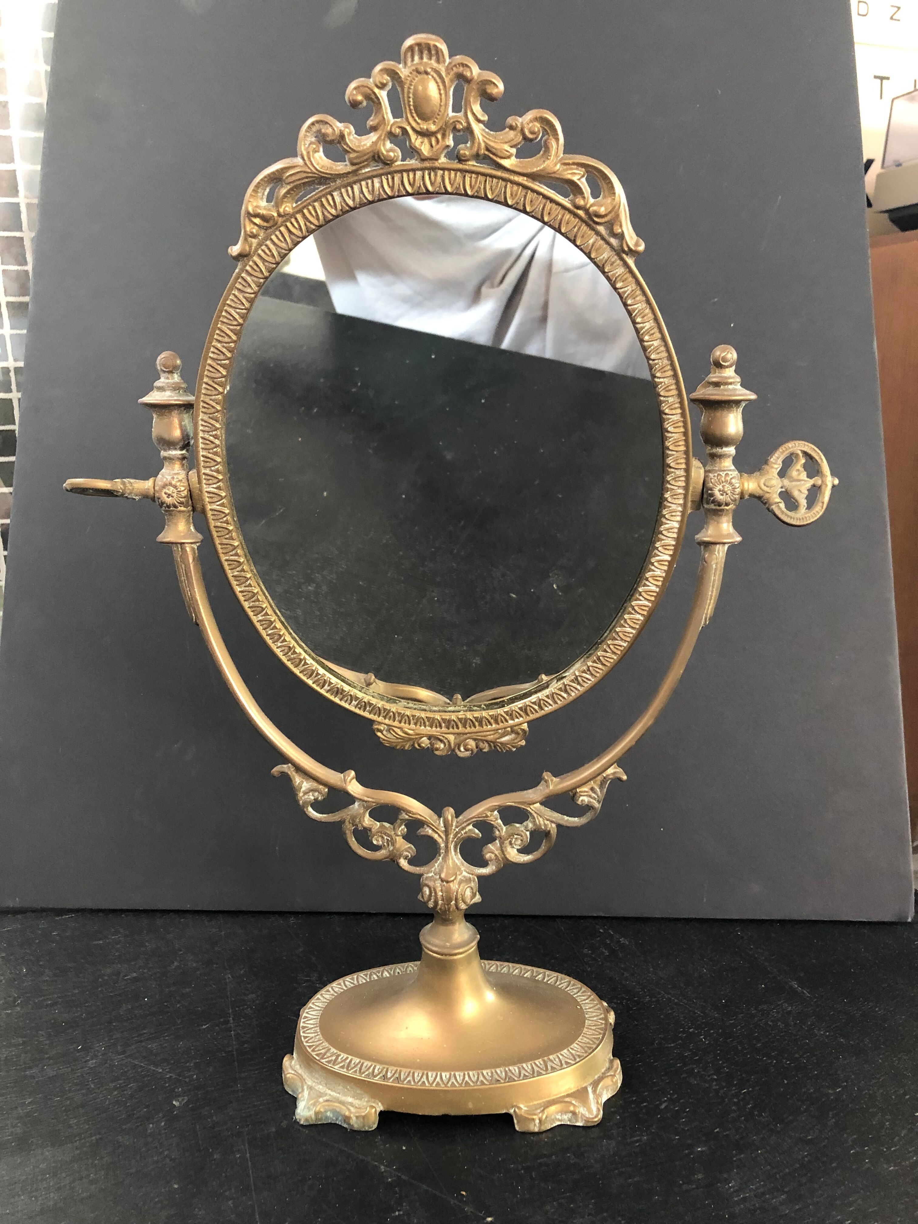 Swivel bronze mirror