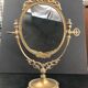 Miroir en bronze pivotant