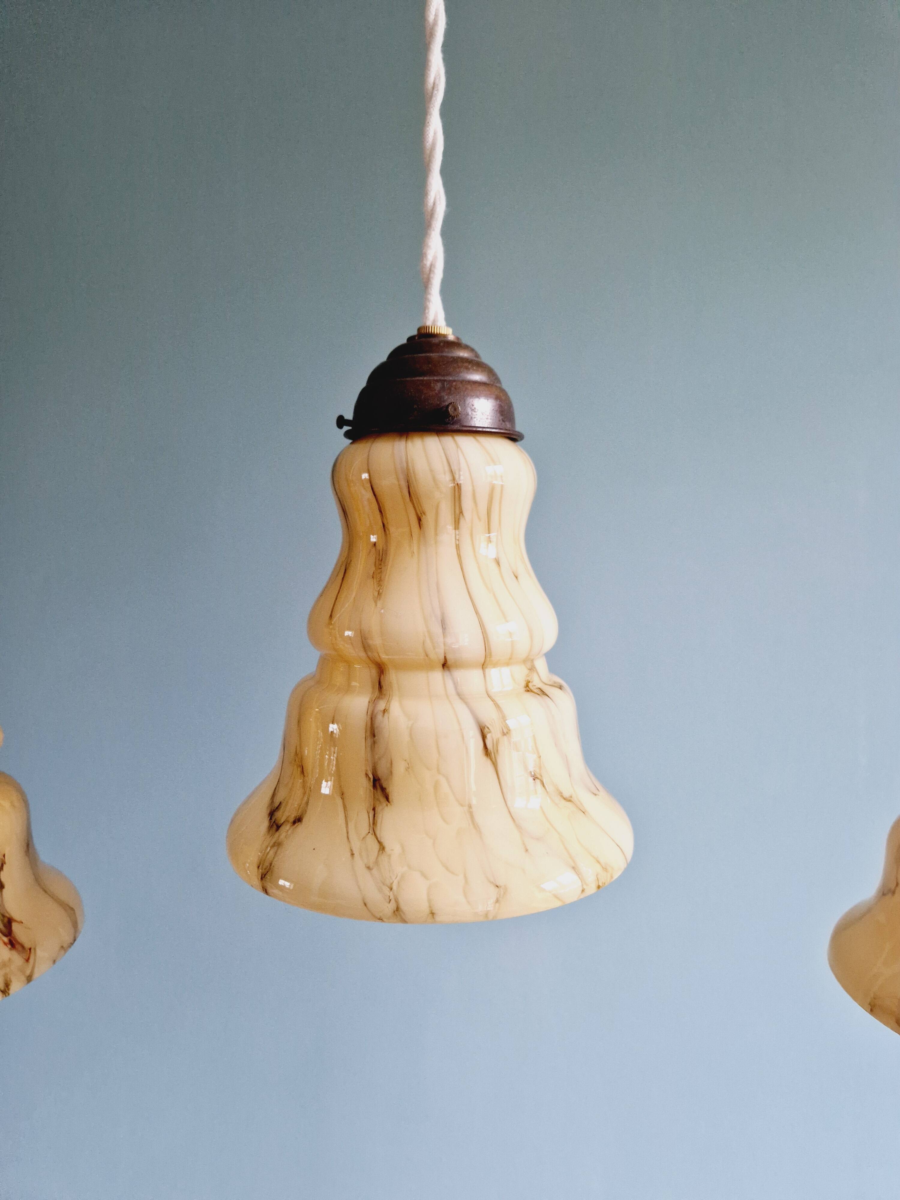 Set of 3 Art Deco marbled opaline pendant lights, 1920s-30s