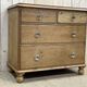 English chest of drawers in nineteenth century fir with its glass buttons