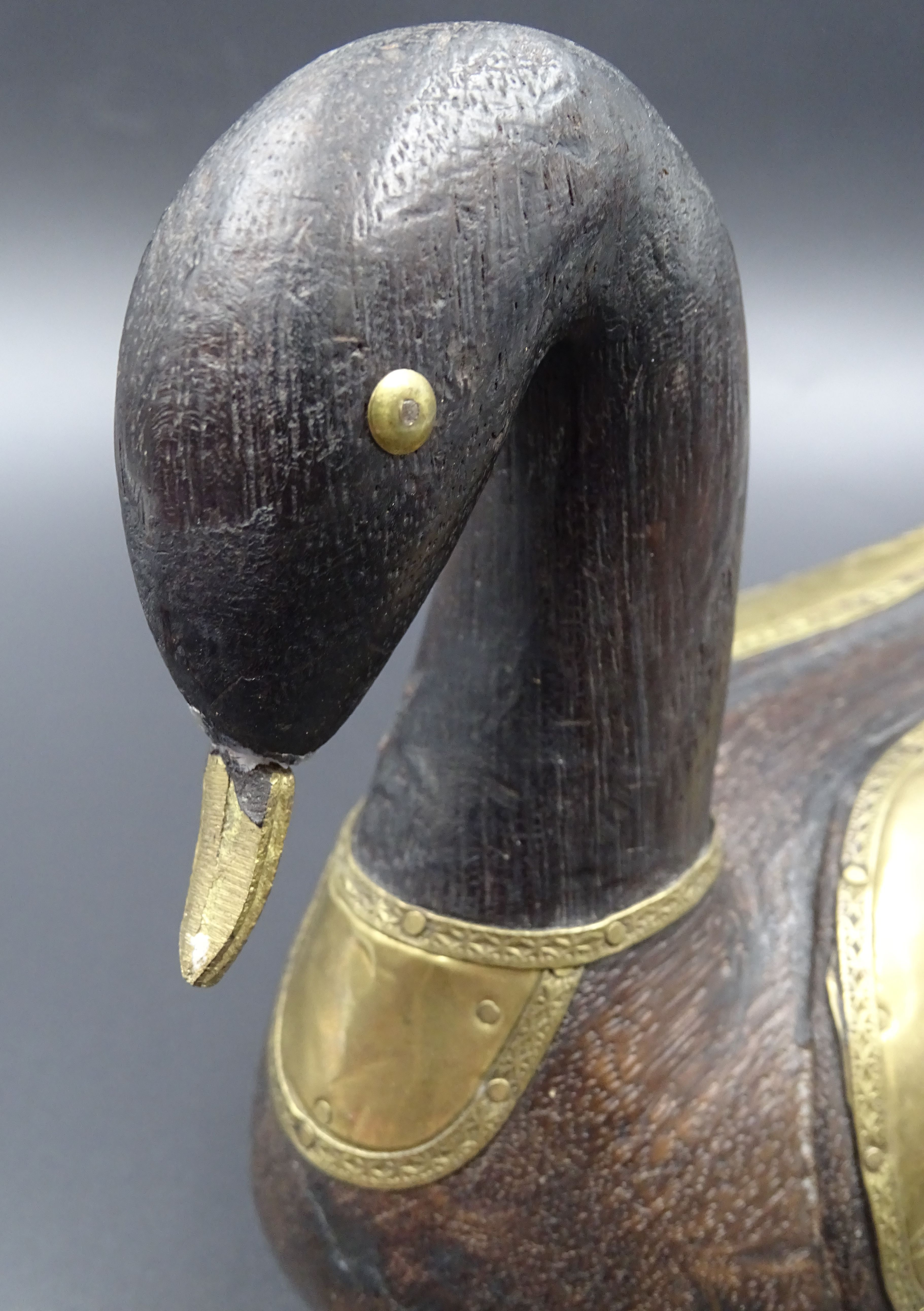 Wooden and brass swan