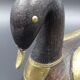 Wooden and brass swan