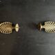 Pair of bronze curtain rod finials in the Napoléon III style with a palmette design.