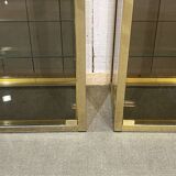 Paire de vitrines d'exposition en chrome doré et verre fumé - années 80