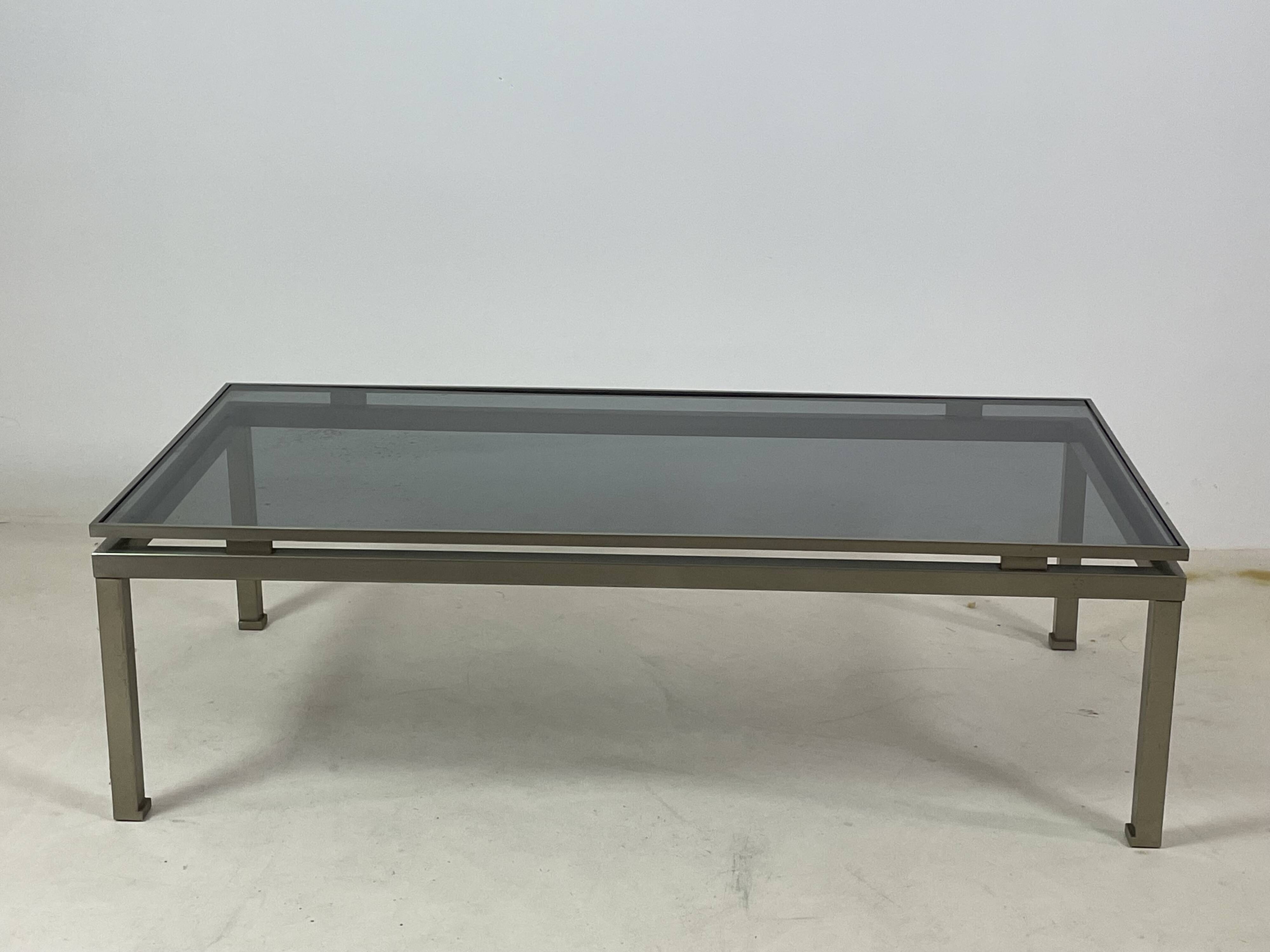 Brass coffee table with smoked glass top by Guy Lefevre, 1970s