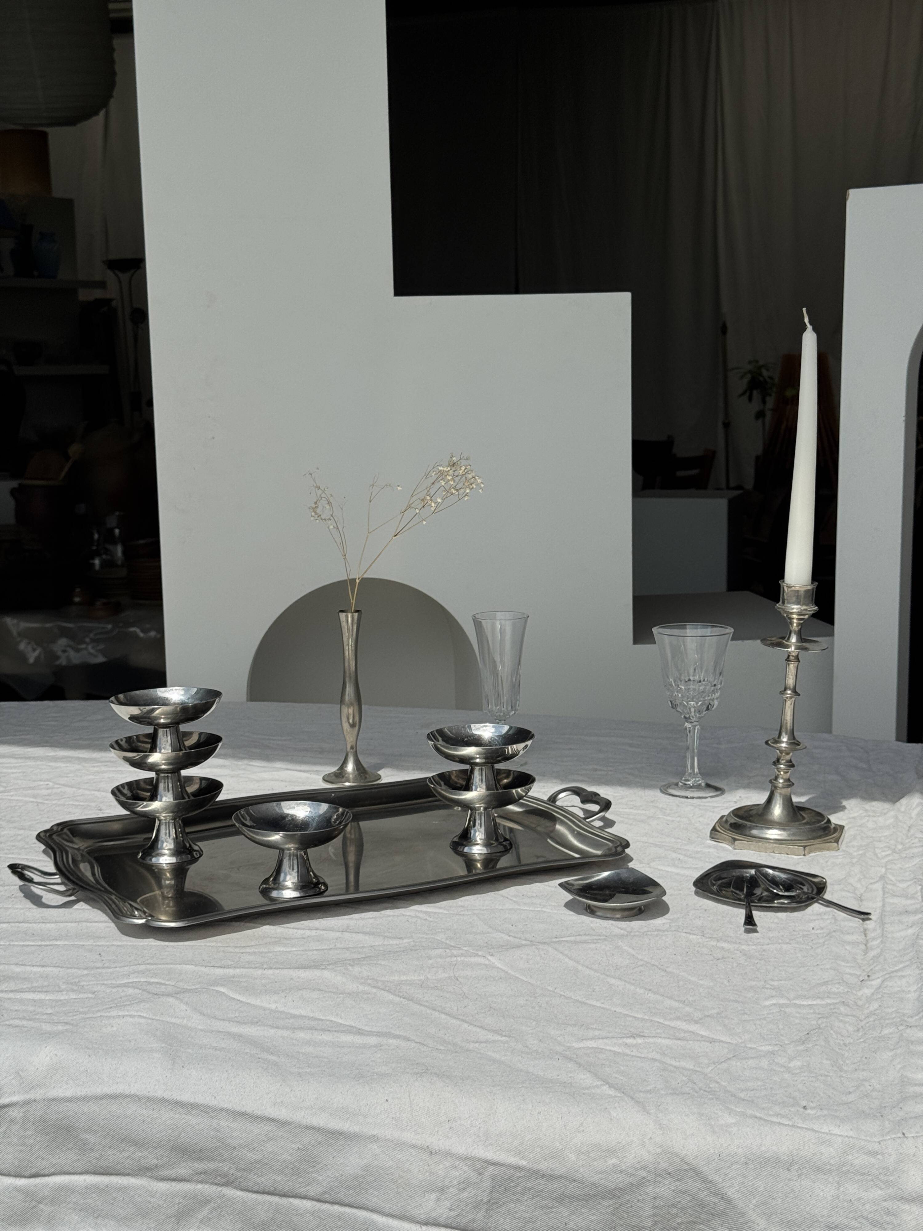A large silver candlestick holder H23