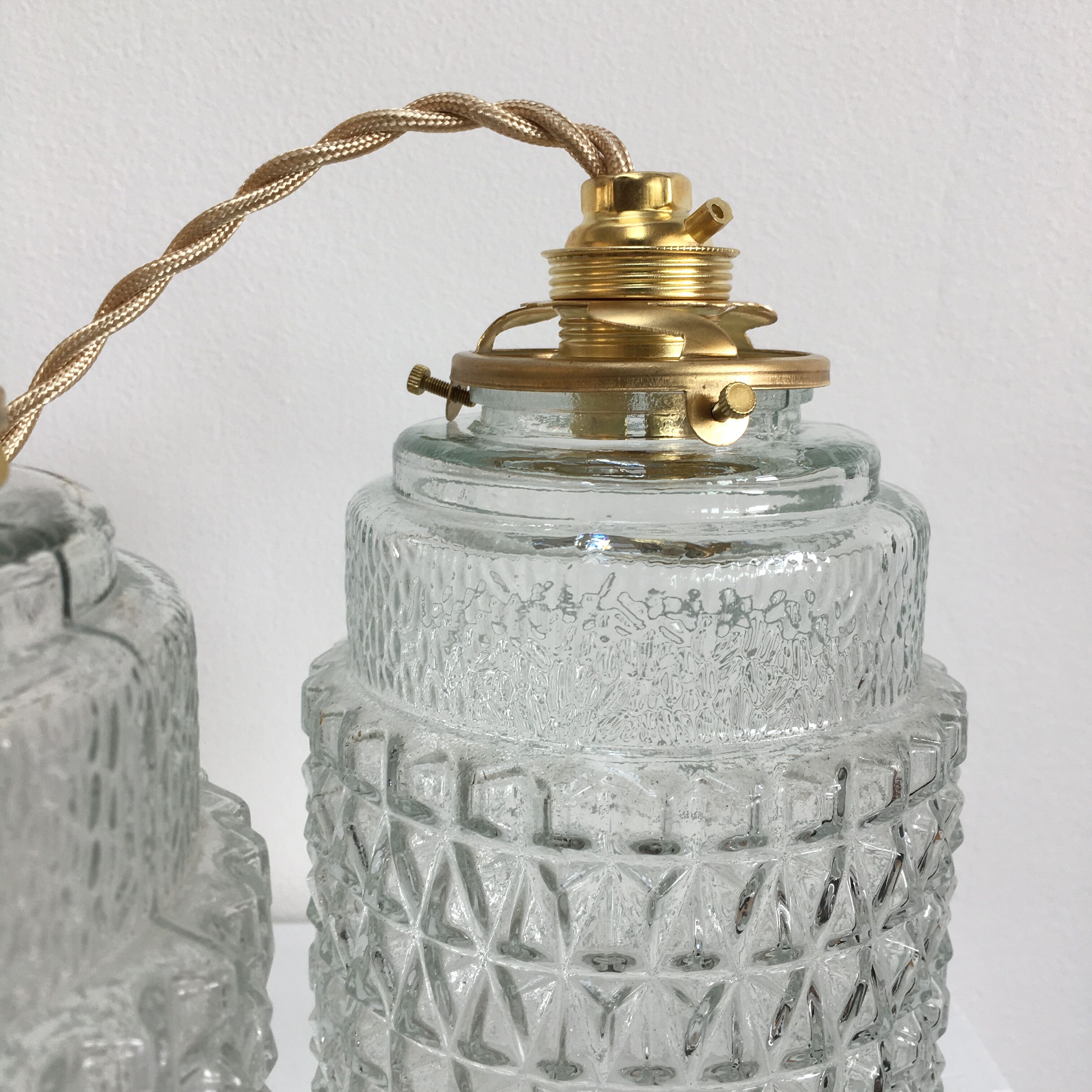 Pair of vintage molded pressed glass pendant lights