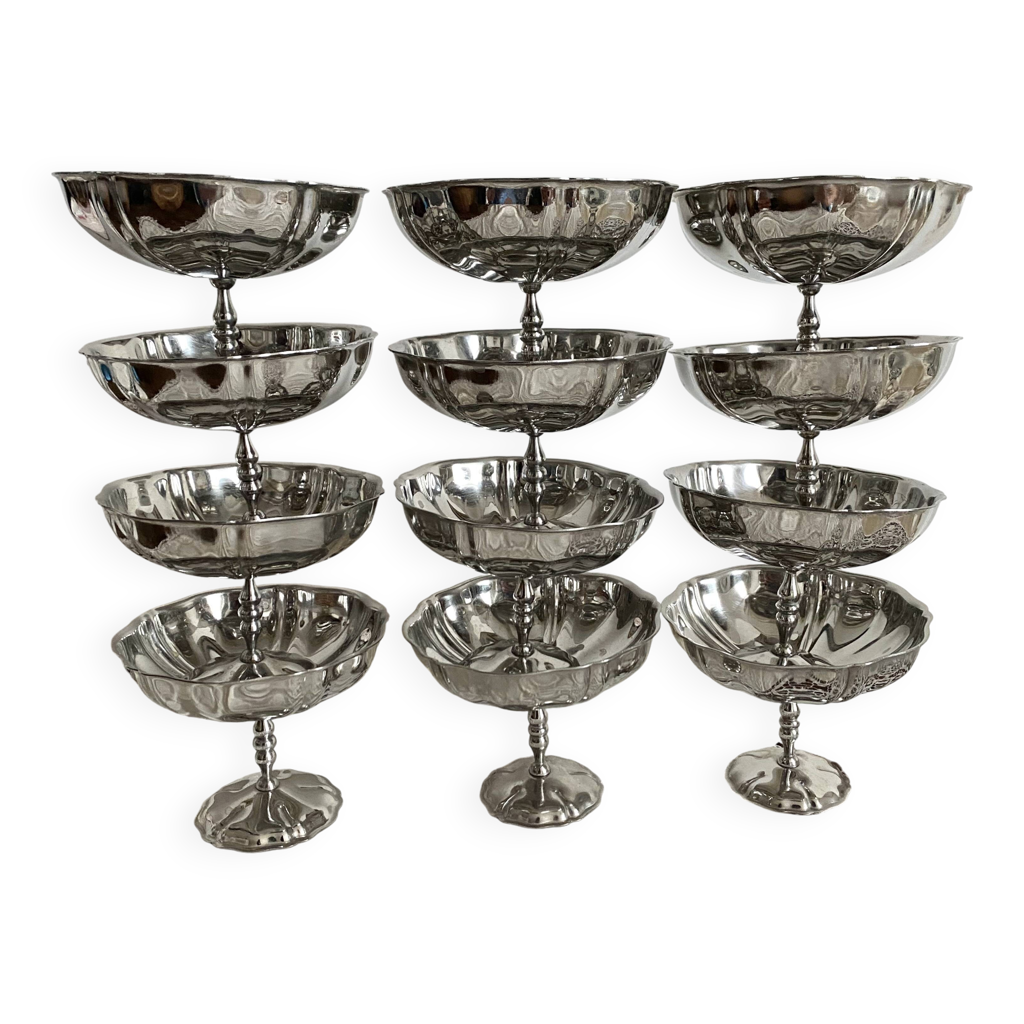 Vintage stainless steel cups on foot