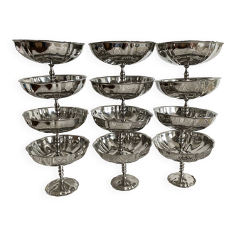 Vintage stainless steel cups on foot