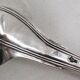 Serving spoon, silver, 18th century, straight thread pattern.