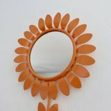 Large 1970s "flower" mirror in orange metal