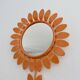 Grand miroir "fleur" 1970 en métal orange