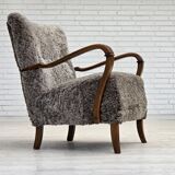 1960s, reupholstered Danish armchair, New Zealand genuine sheepskin.