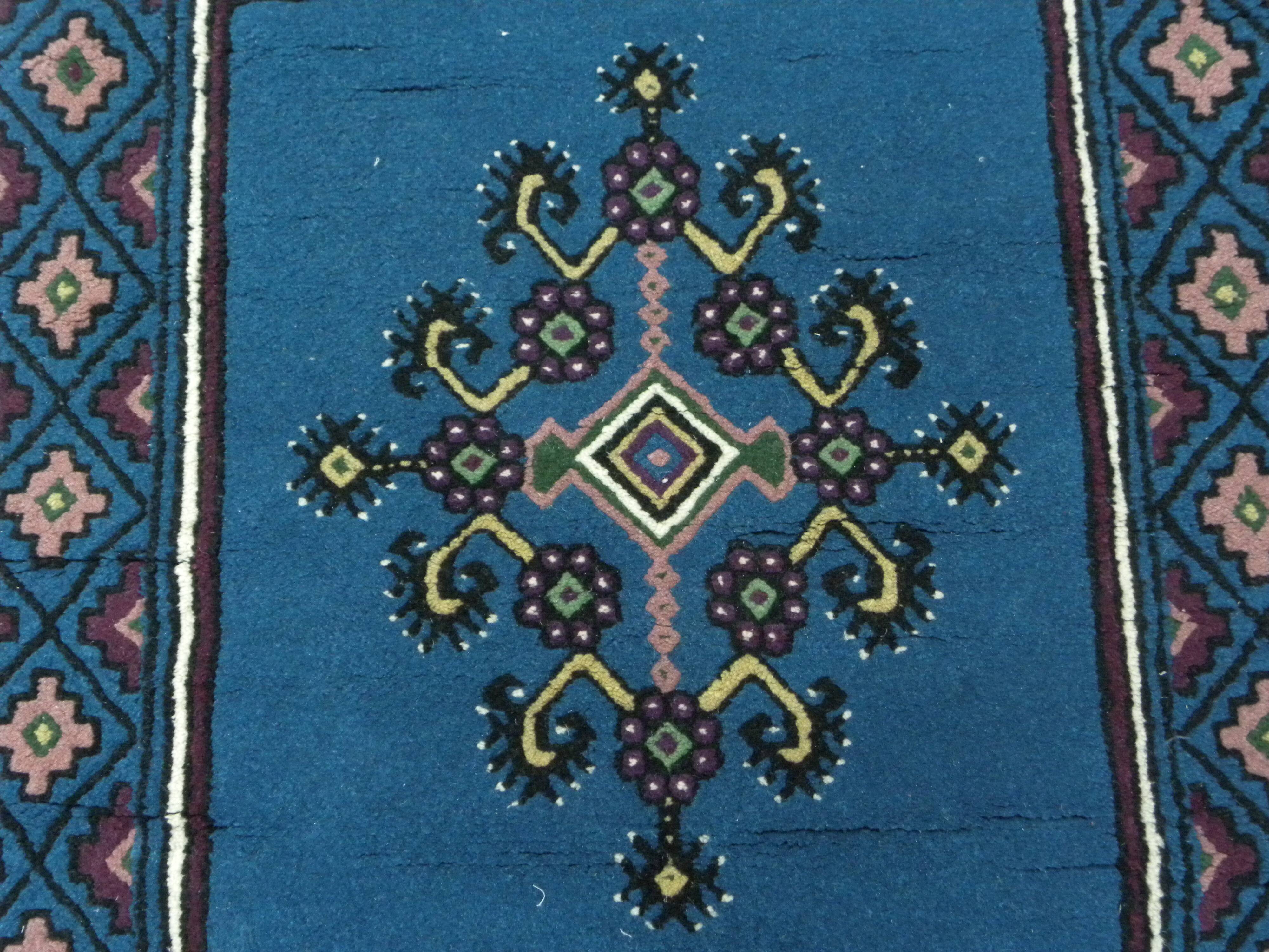Vintage traditional Tunisian oriental rug in handmade blue wool.