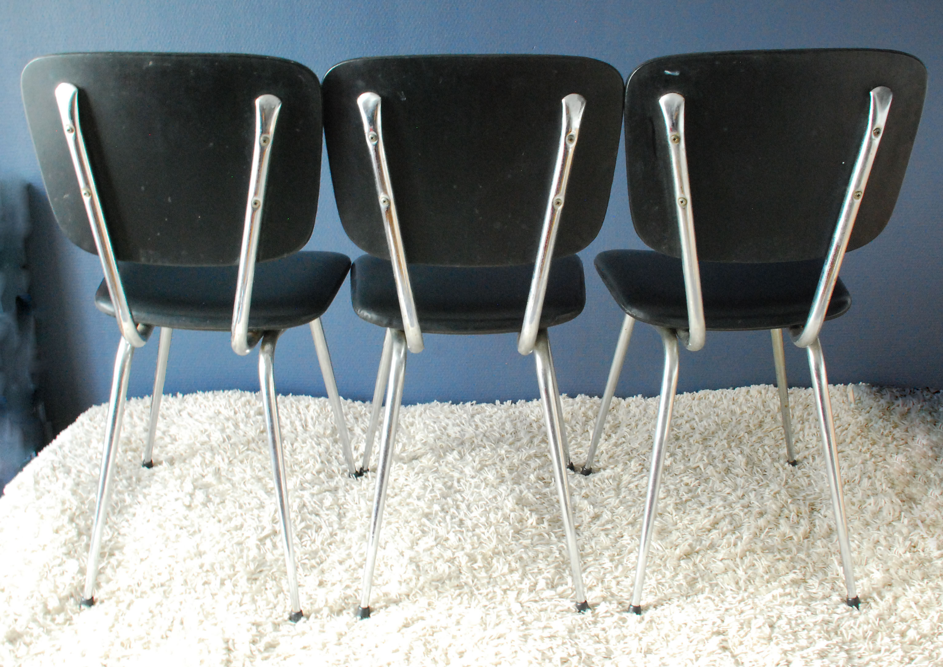 Set of three chairs in black leatherette