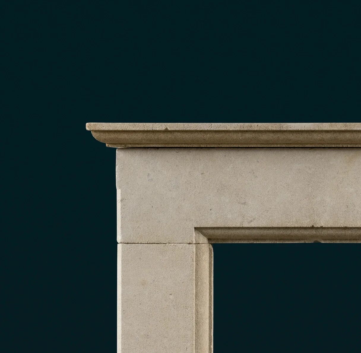 English Bath stone fireplace in the nineteenth century Gothic Revival style