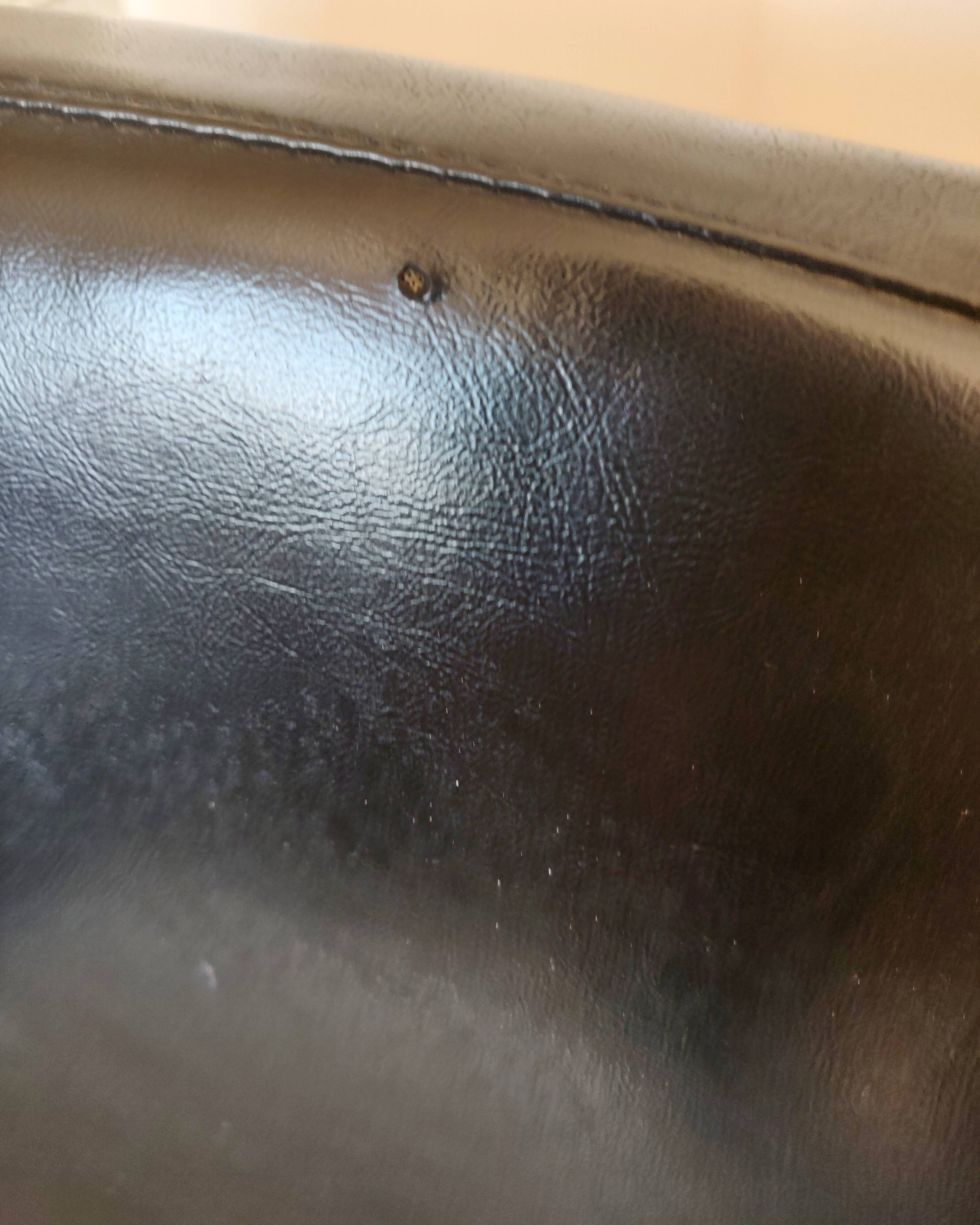 Black vintage conference chair, chrome feet