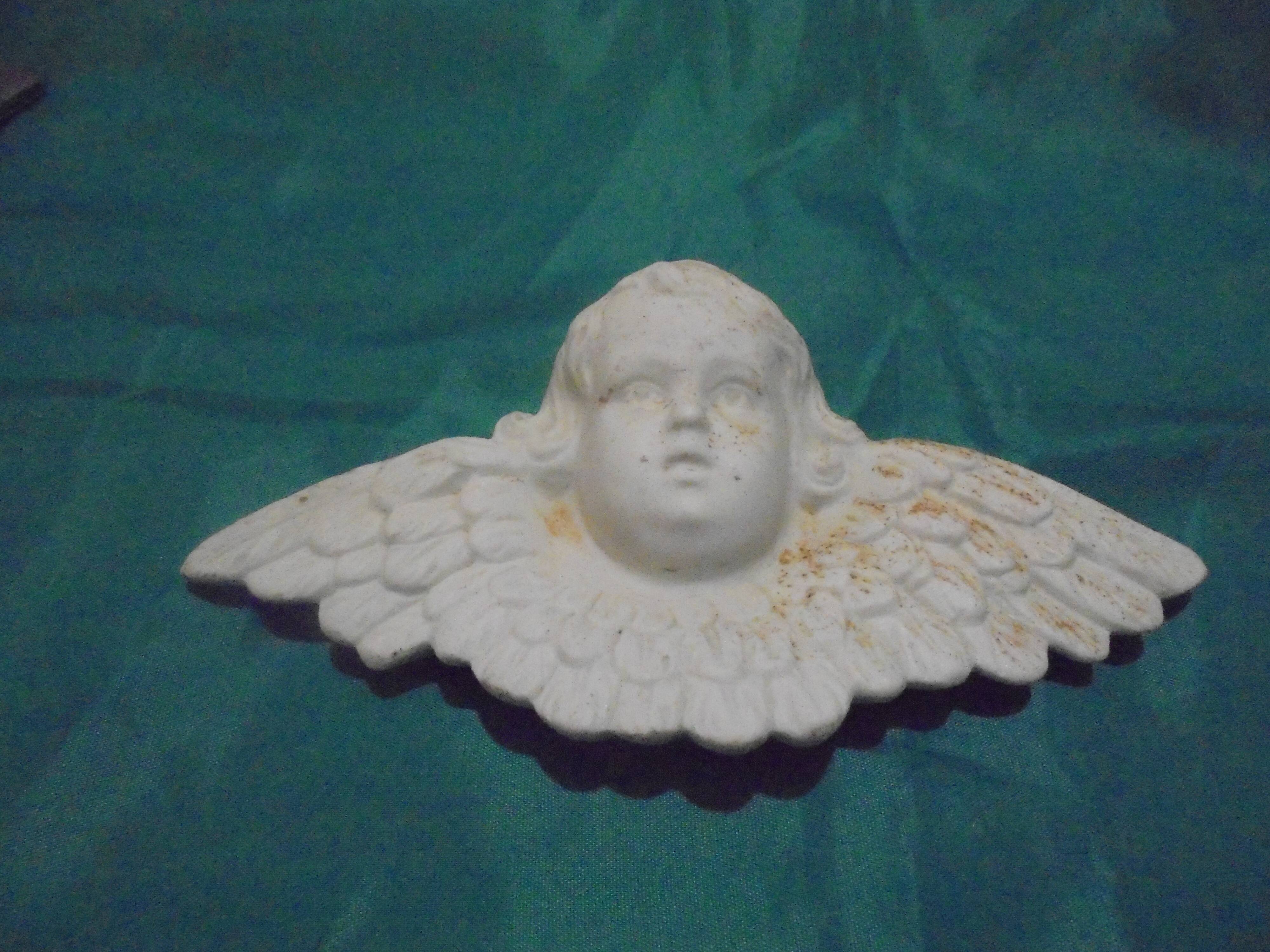 Porcelain angel head