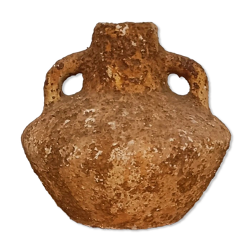 Textured terracotta vase in wabi-sabi style