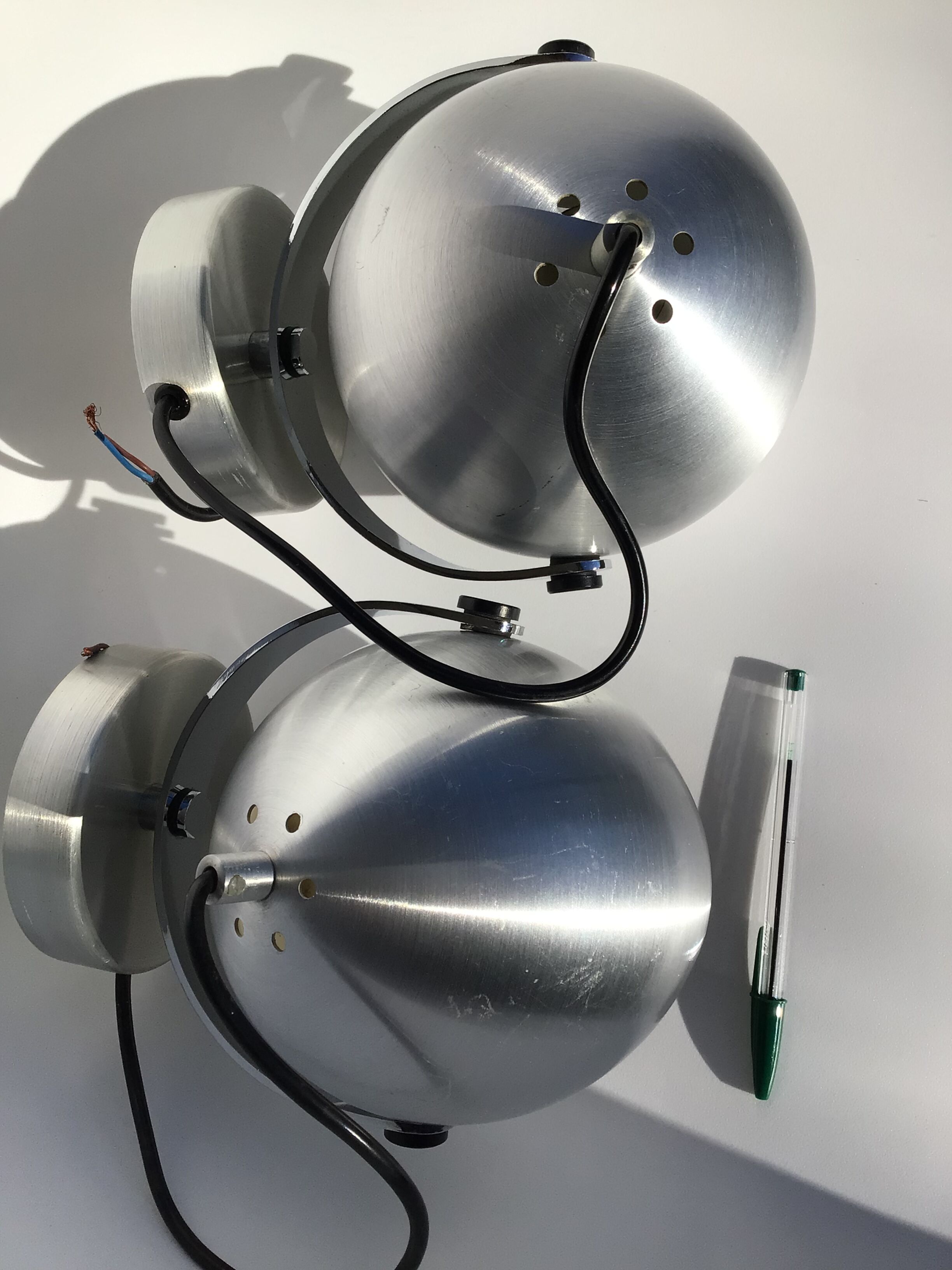Pair of vintage brushed aluminum eyeball wall lamps
