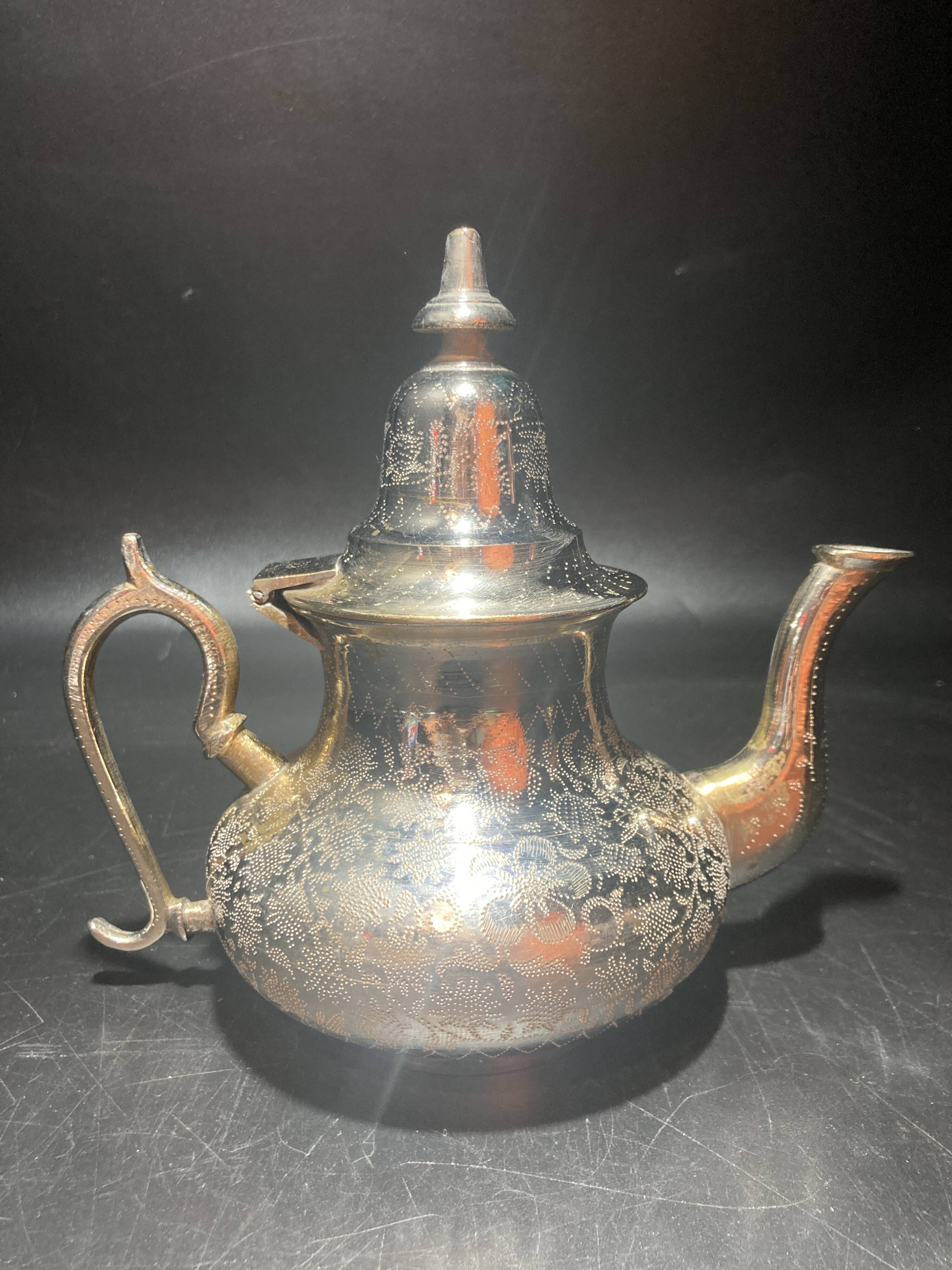 Silver metal teapot