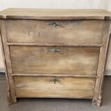 Patinated baroque crossbow chest of drawers