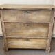 Commode arbalete baroque patinée