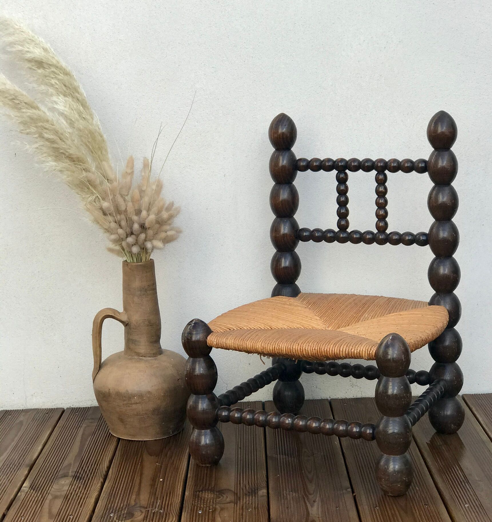 Chaise basse paillée