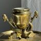 Large 19th century brass candlestick with dolphin motifs