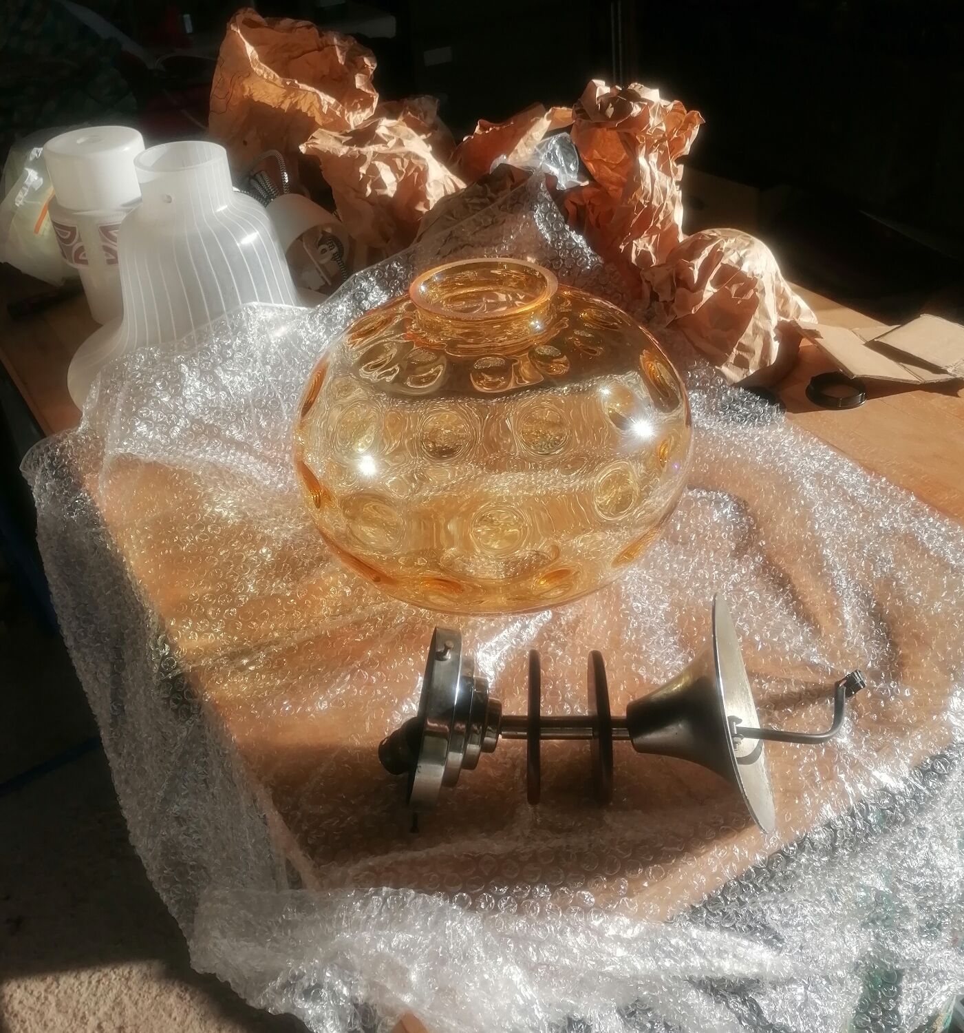 Vintage suspension ball in amber glass