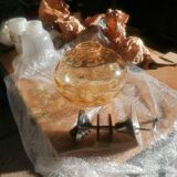 Vintage suspension ball in amber glass