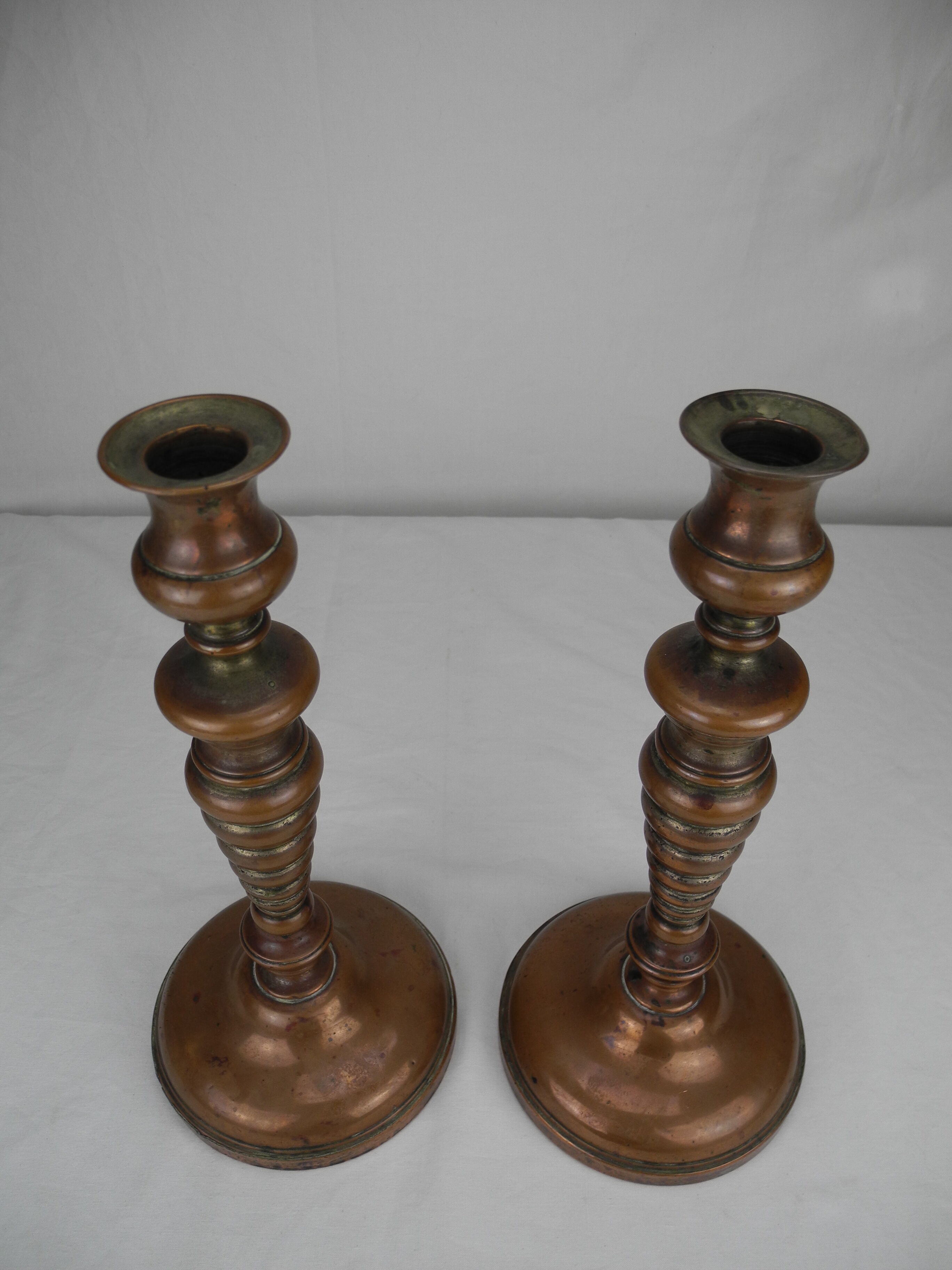 Pair of French copper candlesticks, 19th century